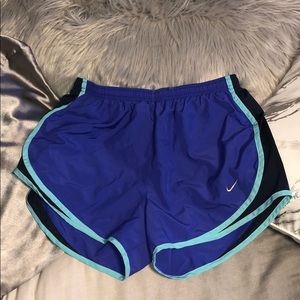 Purple Nike shorts